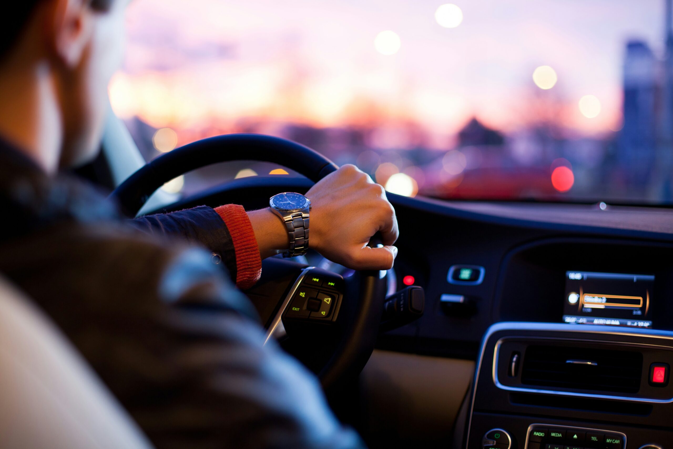 An image showing a person driving a vehicle